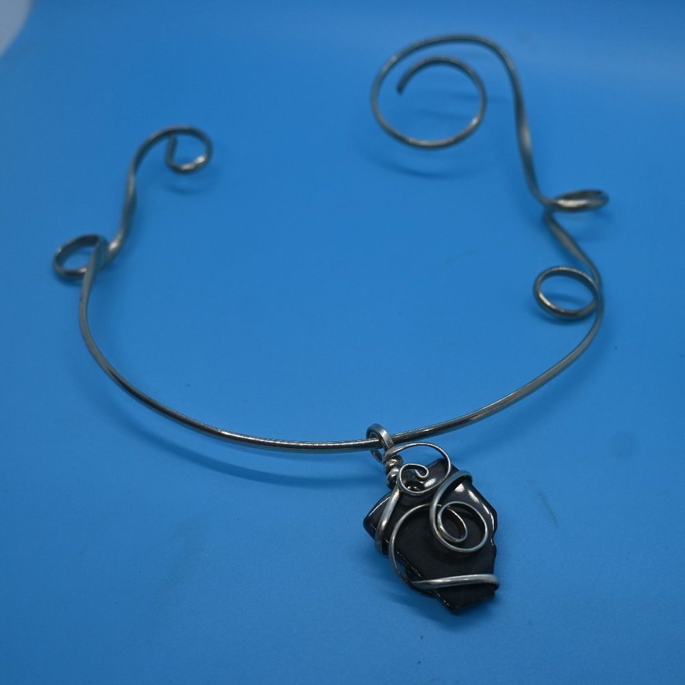 Necklaces, pendants and earrings.